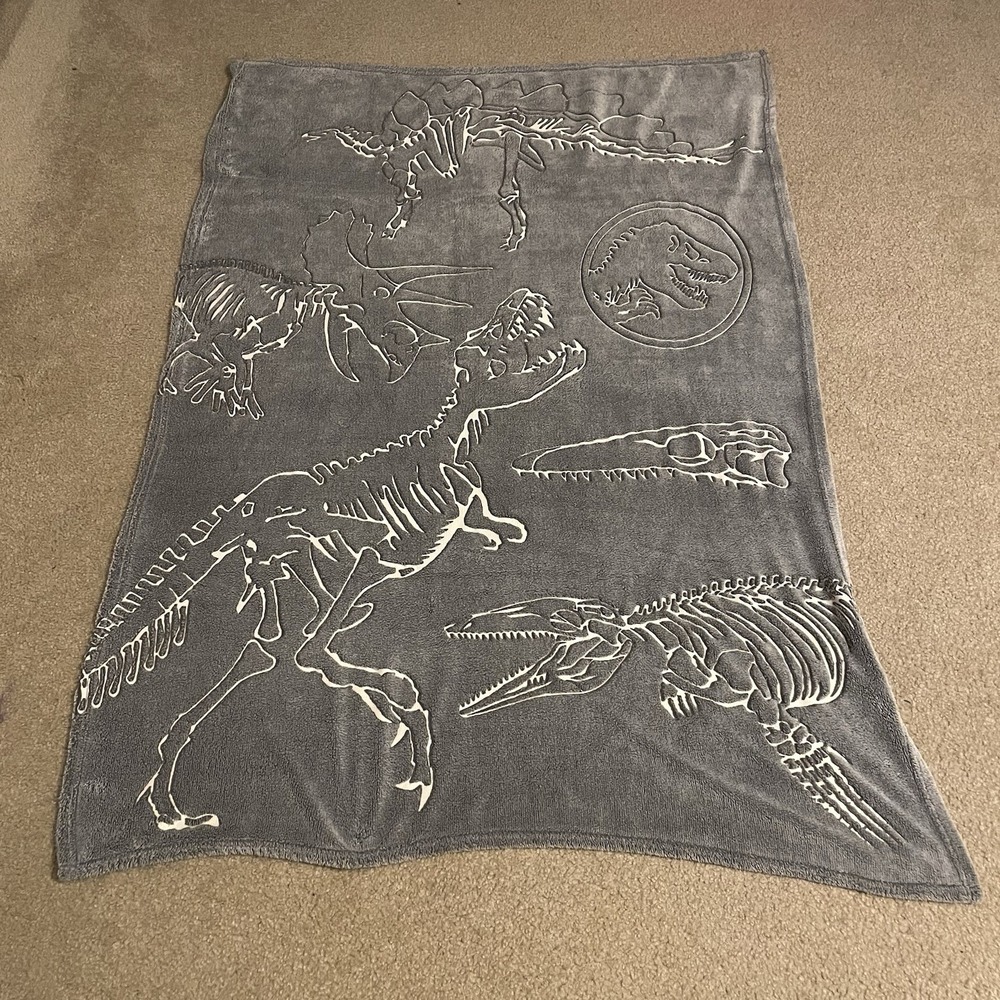 Jurassic World Dominion Gray Glow in the Dark Dinosaur Skeleton Fleece Blanket‎